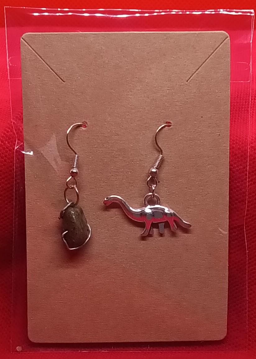 Dinosaur and meteor earrings